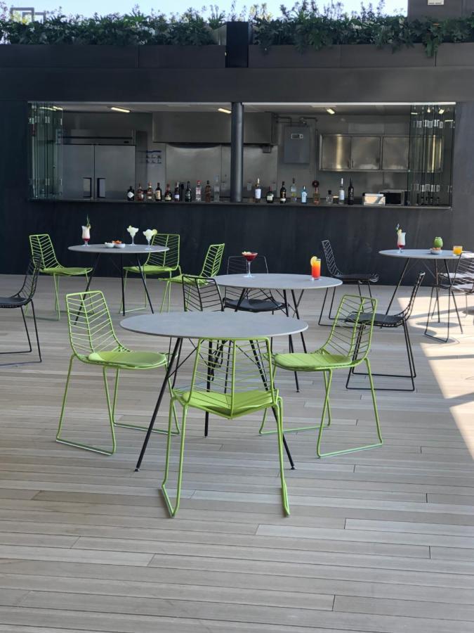 墨西哥城 Galeria Plaza San Jeronimo酒店 外观 照片 Wire chairs